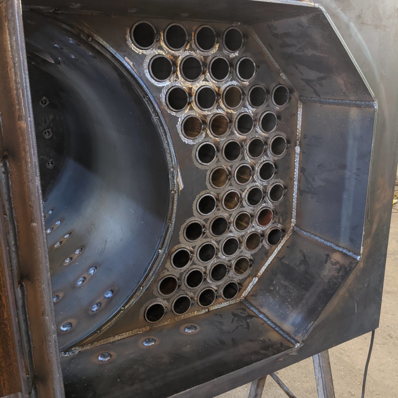 MSU 300 biomass boiler tube nest cleaned and prepared for final welding.