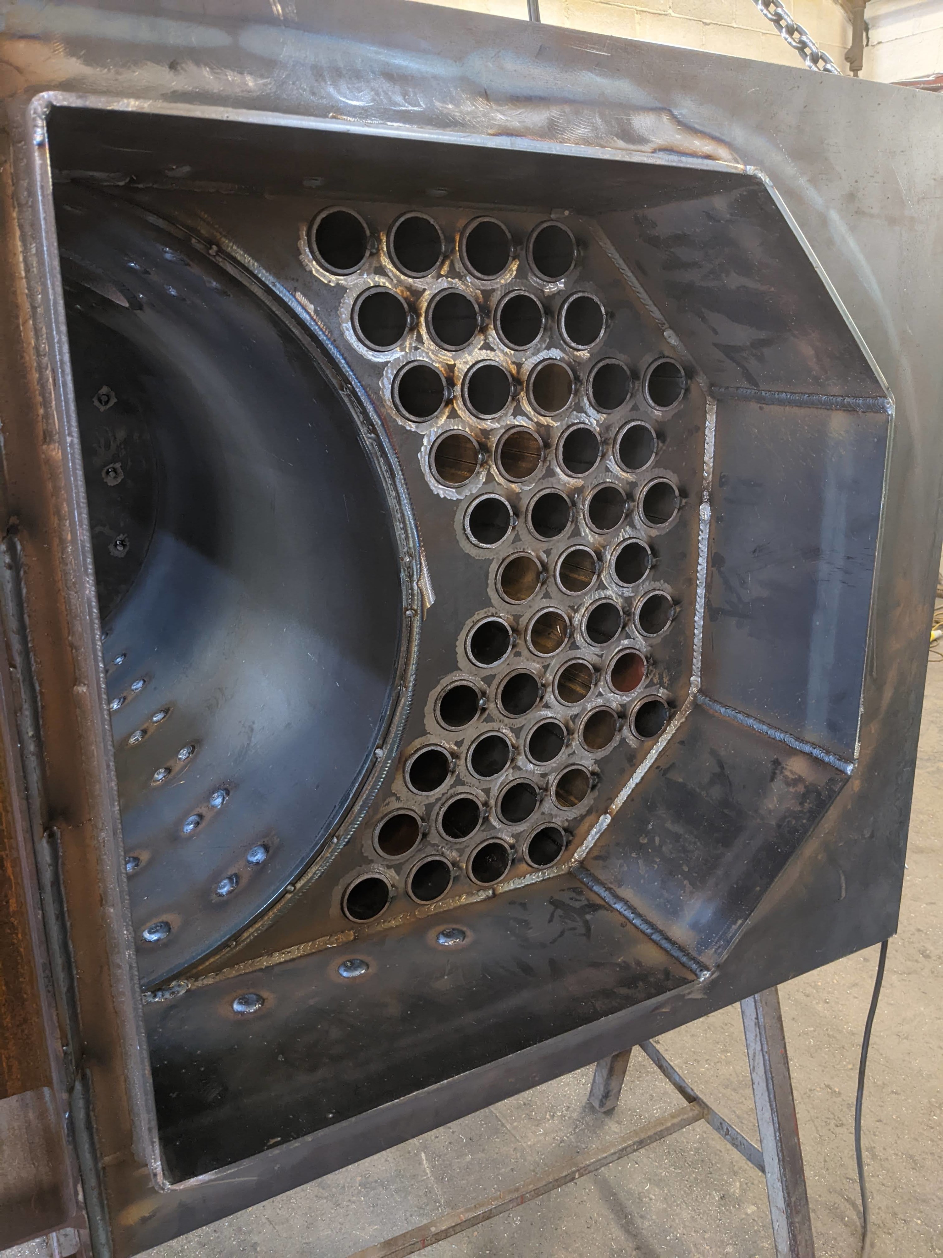 MSU 300 biomass boiler tube nest cleaned and prepared for final welding.